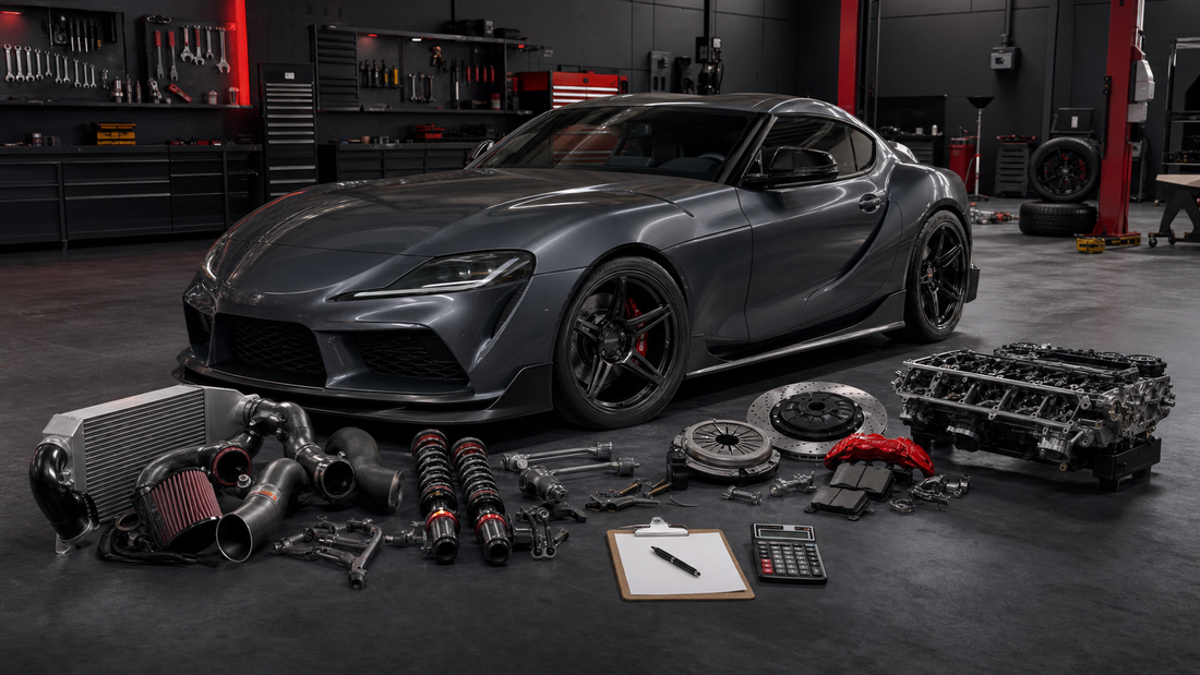 Performance coupe surrounded by intake, suspension, brake, clutch and engine upgrade components