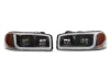 Raxiom 99-06 GMC Sierra 1500 Axial Series Headlights w/ LED Bar- Black Housing (Clear Lens)