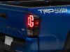 Raxiom 16-23 Toyota Tacoma XW Series Sequential LED Tail Lights- Black Housing- Clear Lens