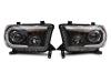 Raxiom 07-13 Toyota Tundra Axial Projector Headlights w/ SEQL LED Bar- Black Housing (Clear Lens)