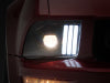 Raxiom 05-09 Ford Mustang w/ Halogen Projector Headlights- Black Housing (Clear Lens) (No GT500 )