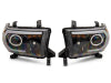 Raxiom 07-13 Toyota Tundra Axial Series Projector Headlights w/ LED Bar- Black Housing (Clear Lens)