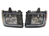 Raxiom 07-13 GMC Sierra 1500 Axial Series Headlights w/ LED Bar- Black Housing (Clear Lens)