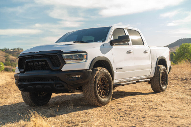 DV8 Offroad 19-25 RAM 1500 Crew Cab OE Plus Side Steps - Black Steel