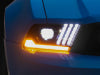 Raxiom 10-12 Ford Mustang LED Projector Headlights SEQL Turn Signals- Black Housing (Clear Lens)
