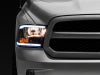 Raxiom 09-18 Dodge RAM 1500/2500/3500 Axial Series Headlights w/ LED Bar- Black Housing (Clear Lens)