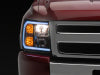 Raxiom 07-13 Chevrolet Silverado 1500 Axial Headlights w/ SEQL LED Bar- Black Housing (Clear Lens)
