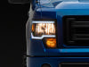 Raxiom 09-14 Ford F-150 Axial Series Headlight w/ SEQL LED Bar- Black Housing (Clear Lens)