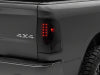 Raxiom 09-18 Dodge RAM 1500/2500/3500 Axial Series LED Tail Lights- Black Housing- Smoked Lens