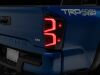 Raxiom 16-23 Toyota Tacoma ST LED Tail Lights- Black Housing- Smoked Lens