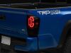 Raxiom 16-23 Toyota Tacoma XW Series Sequential LED Tail Lights- Black Housing/ Smoked Lens