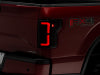 Raxiom 15-17 Ford F-150 Axial Series LED Tail Lights- Black Housing (Smoked Lens)